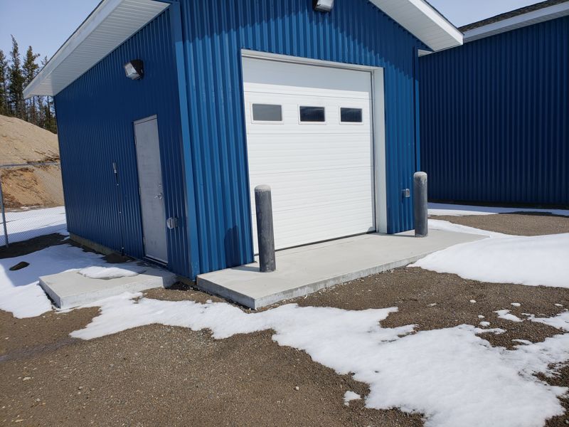 Garage overhead door and new concrete apron
